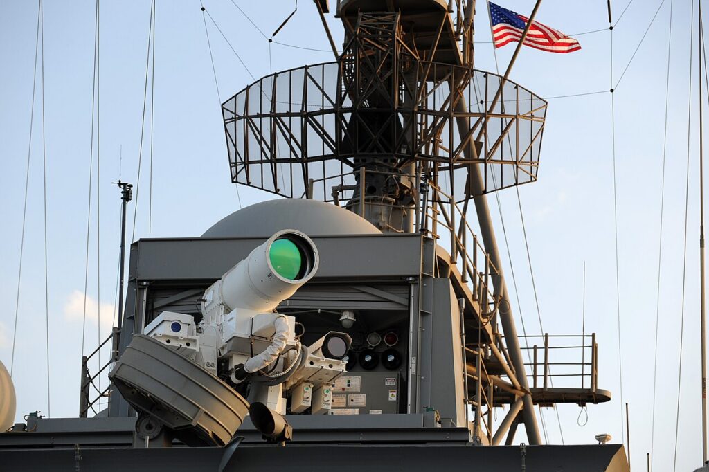 The U.S. Navy Afloat Forward Staging Base (Interim) USS Ponce (AFSB(I)-15) conducts an operational demonstration of the Office of Naval Research (ONR)–sponsored Laser Weapon System (LaWS) while deployed to the Arabian Gulf. (Source: U.S. Navy)